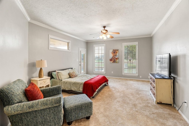 bedroom featuring crown molding, light colored carpet, ceiling fan, and a textured ceiling