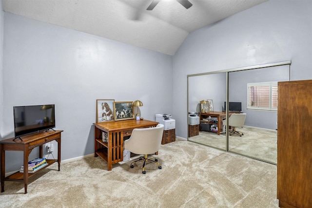 office with vaulted ceiling, carpet, a textured ceiling, and ceiling fan