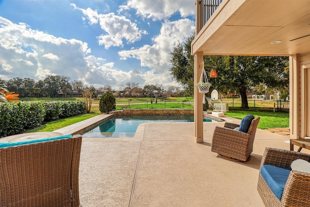 view of pool featuring a patio