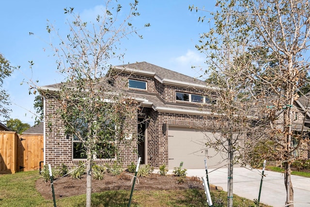 front of property with a garage