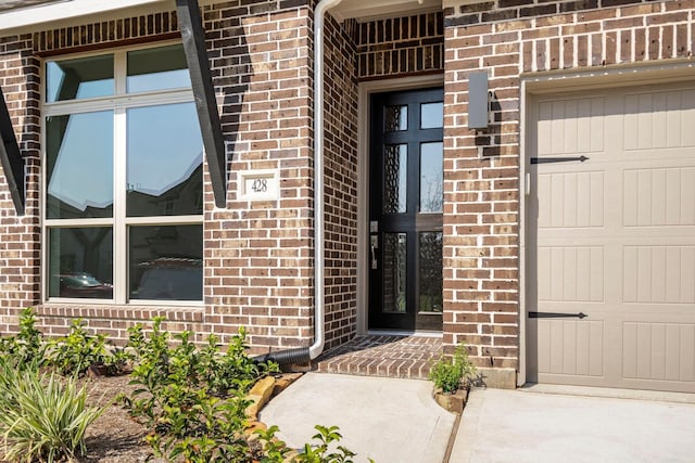 property entrance featuring a garage