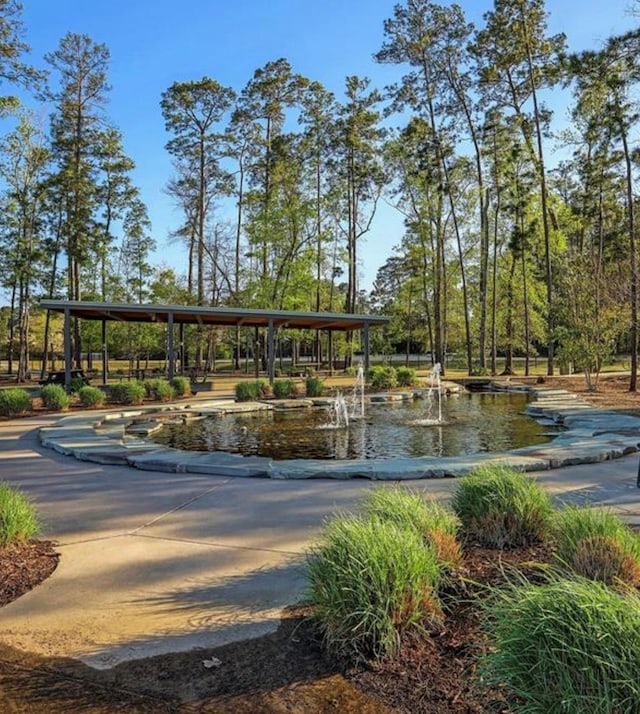 view of property's community with a water view