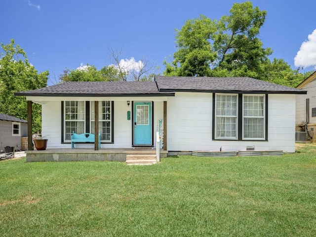 ranch-style house with central AC, a front yard, and a porch
