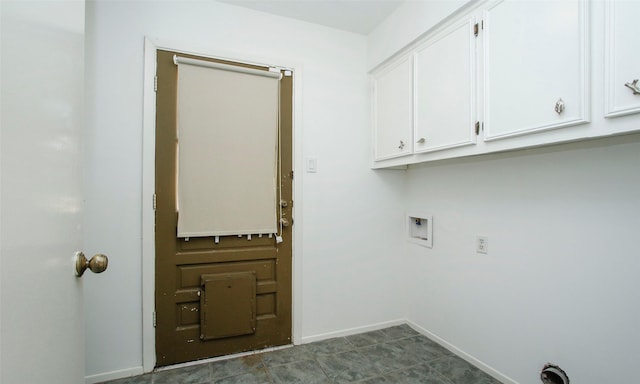 washroom with cabinets and washer hookup