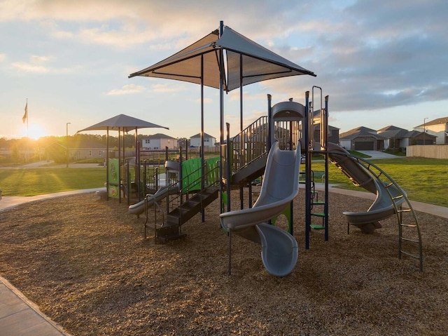 playground at dusk with a yard