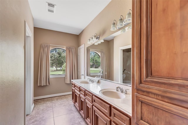 bathroom featuring vanity and tile patterned flooring