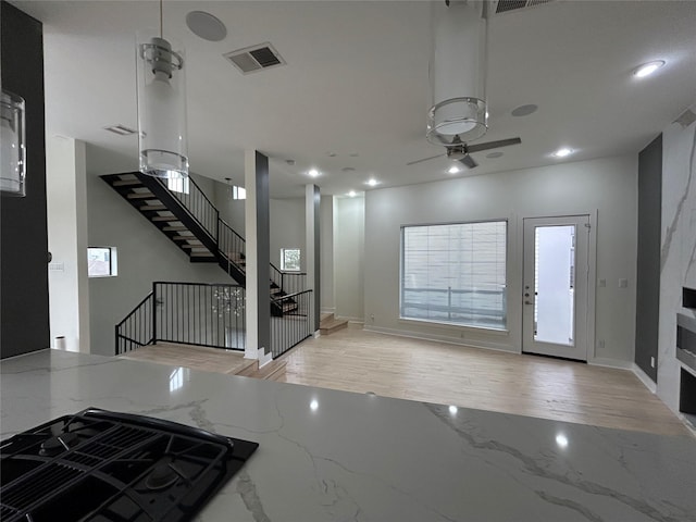 entrance foyer featuring marble finish floor, recessed lighting, visible vents, ceiling fan, and stairs