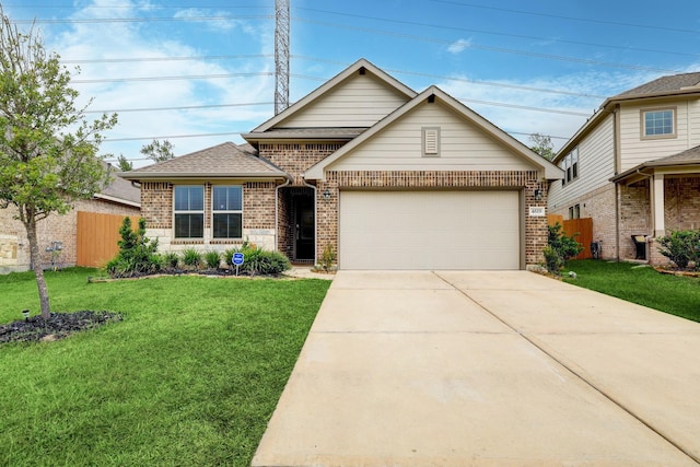 view of front facade featuring a garage and a front lawn