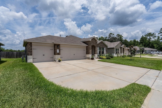 single story home with a garage and a front yard