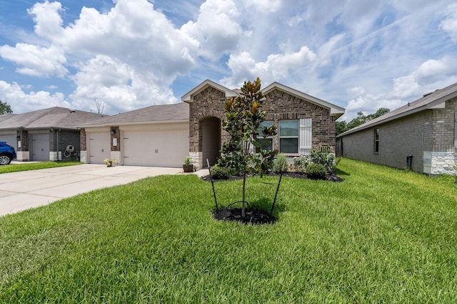 view of front of property with a garage and a front lawn