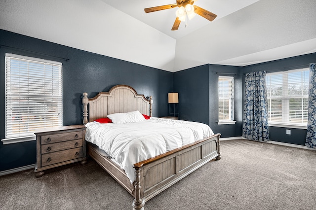 bedroom featuring vaulted ceiling, carpet, and ceiling fan