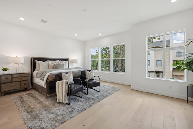 bedroom featuring light wood-type flooring