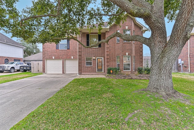 view of front of home featuring a garage and a front lawn