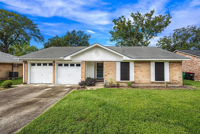 single story home with central AC unit, a garage, and a front yard