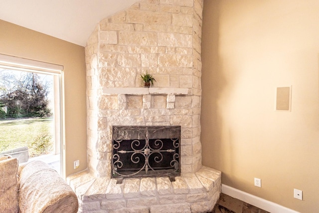 interior space with a stone fireplace