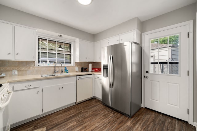 9 Bay Harbor Dr, La Porte, TX 77571 - kitchen with white cabinetry, stainless steel refrigerator with ice dispenser, and white dishwasher