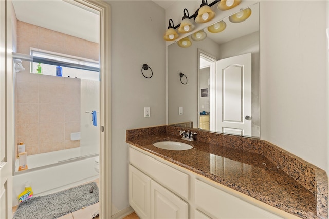 full bathroom featuring shower / washtub combination, vanity, and toilet