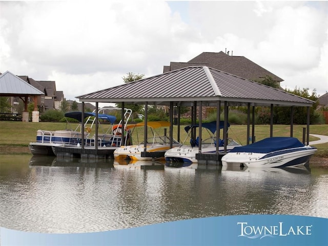 view of dock featuring a water view, a yard, and a gazebo