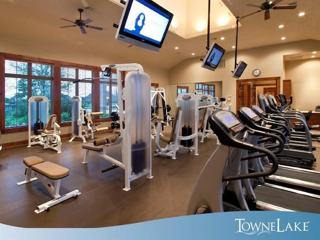 gym featuring a ceiling fan, lofted ceiling, baseboards, and recessed lighting