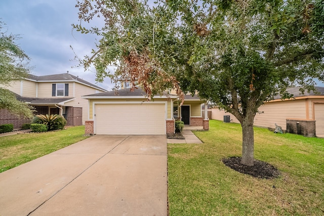 view of front of home with a garage and a front yard