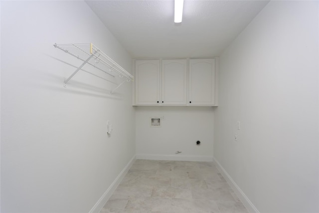 laundry area featuring cabinets, hookup for an electric dryer, hookup for a gas dryer, and hookup for a washing machine