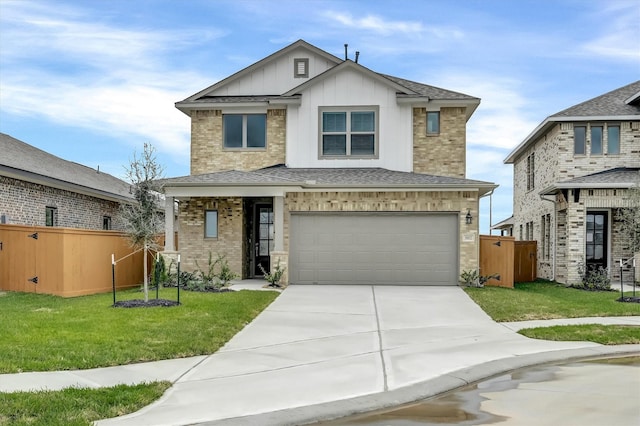 view of front of property featuring board and batten siding, driveway, a front yard, and fence