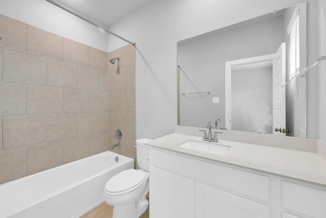 full bath with vanity, toilet, and shower / bathing tub combination