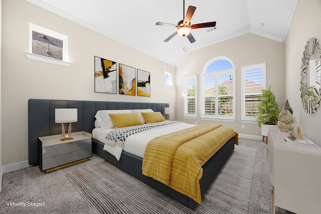 carpeted bedroom featuring lofted ceiling, visible vents, crown molding, and baseboards