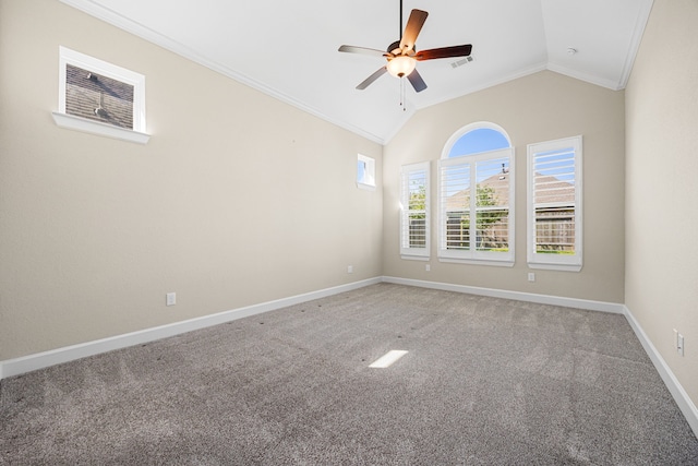 carpeted spare room featuring baseboards, visible vents, ceiling fan, ornamental molding, and vaulted ceiling