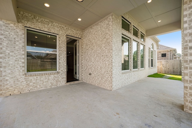 view of patio with fence