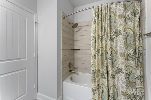 bathroom with shower / tub combo