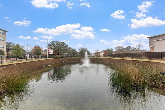 water view featuring fence