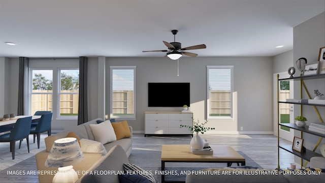 living room featuring ceiling fan and light wood-type flooring