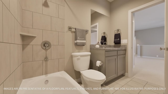 bathroom with vanity, a bathing tub, and toilet