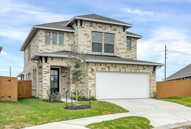 view of front facade with driveway, a front lawn, fence, a shingled roof, and brick siding