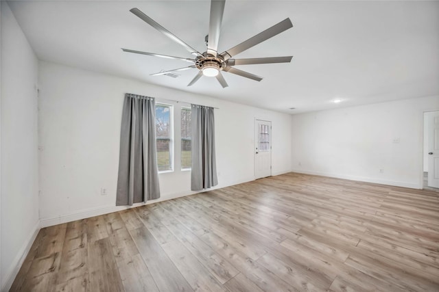 unfurnished room with ceiling fan and light hardwood / wood-style flooring