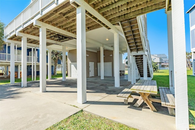 view of patio / terrace featuring a carport
