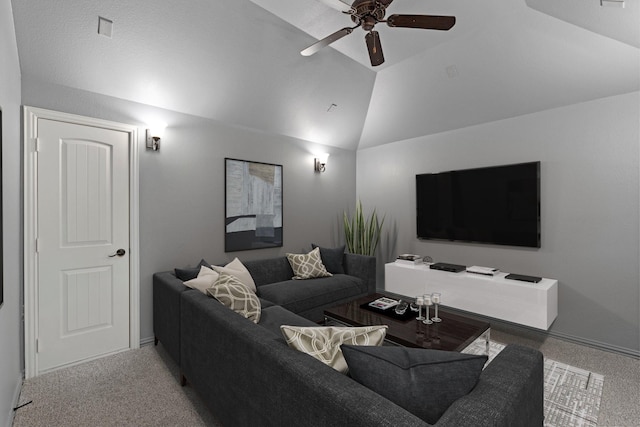 living room with ceiling fan, light colored carpet, and lofted ceiling