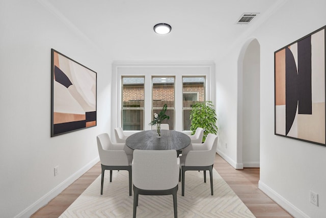 dining room featuring light hardwood / wood-style floors