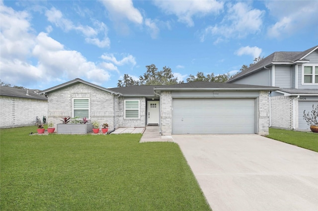 view of front of home with a garage and a front lawn