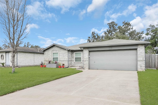 single story home with a garage and a front yard