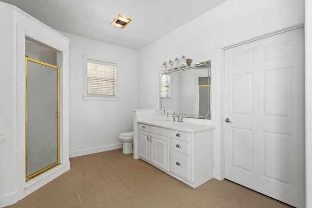 803 S Converse St, Flatonia, TX 78941 - bathroom with toilet, wood-type flooring, vanity, and walk in shower