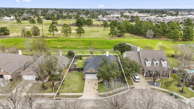 birds eye view of property with a residential view