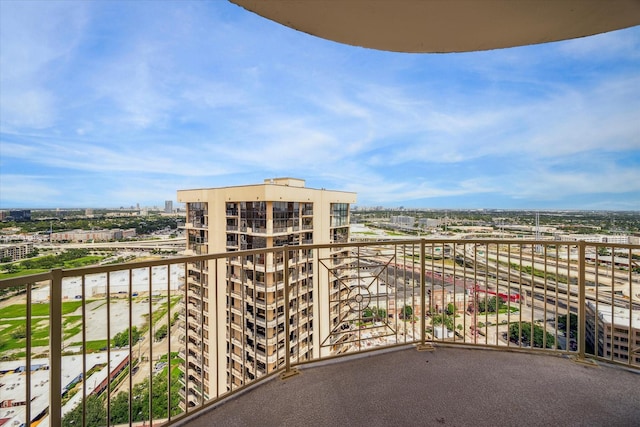 balcony featuring a city view