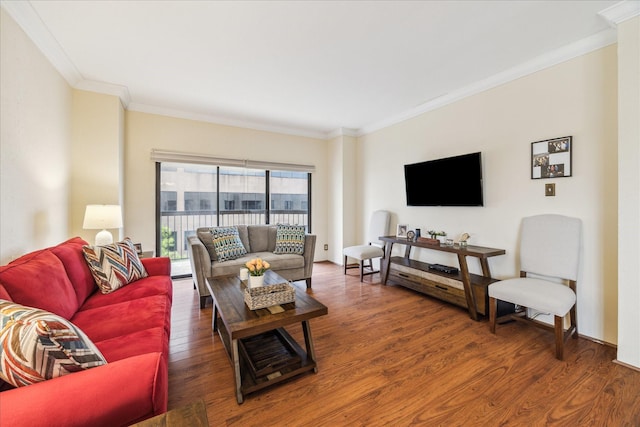 living room with crown molding and dark wood-type flooring