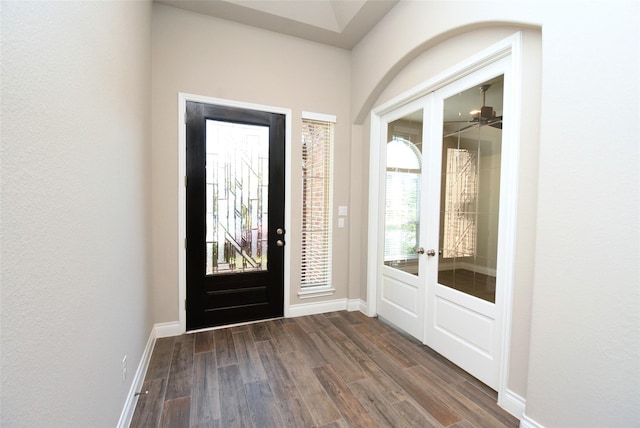 entryway with french doors and dark hardwood / wood-style floors