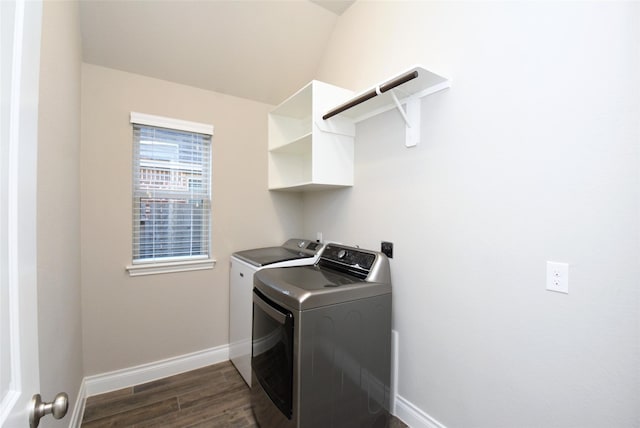 clothes washing area with independent washer and dryer and dark hardwood / wood-style floors