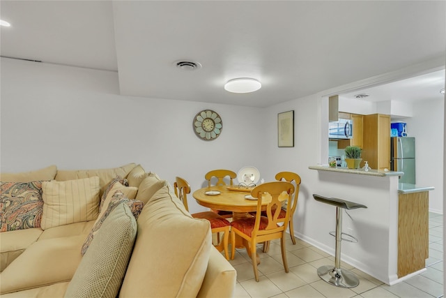 view of tiled dining space