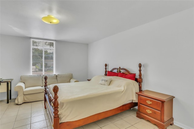 bedroom featuring light tile patterned floors