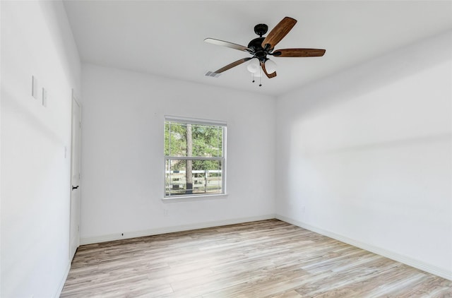 unfurnished room with ceiling fan and light hardwood / wood-style floors